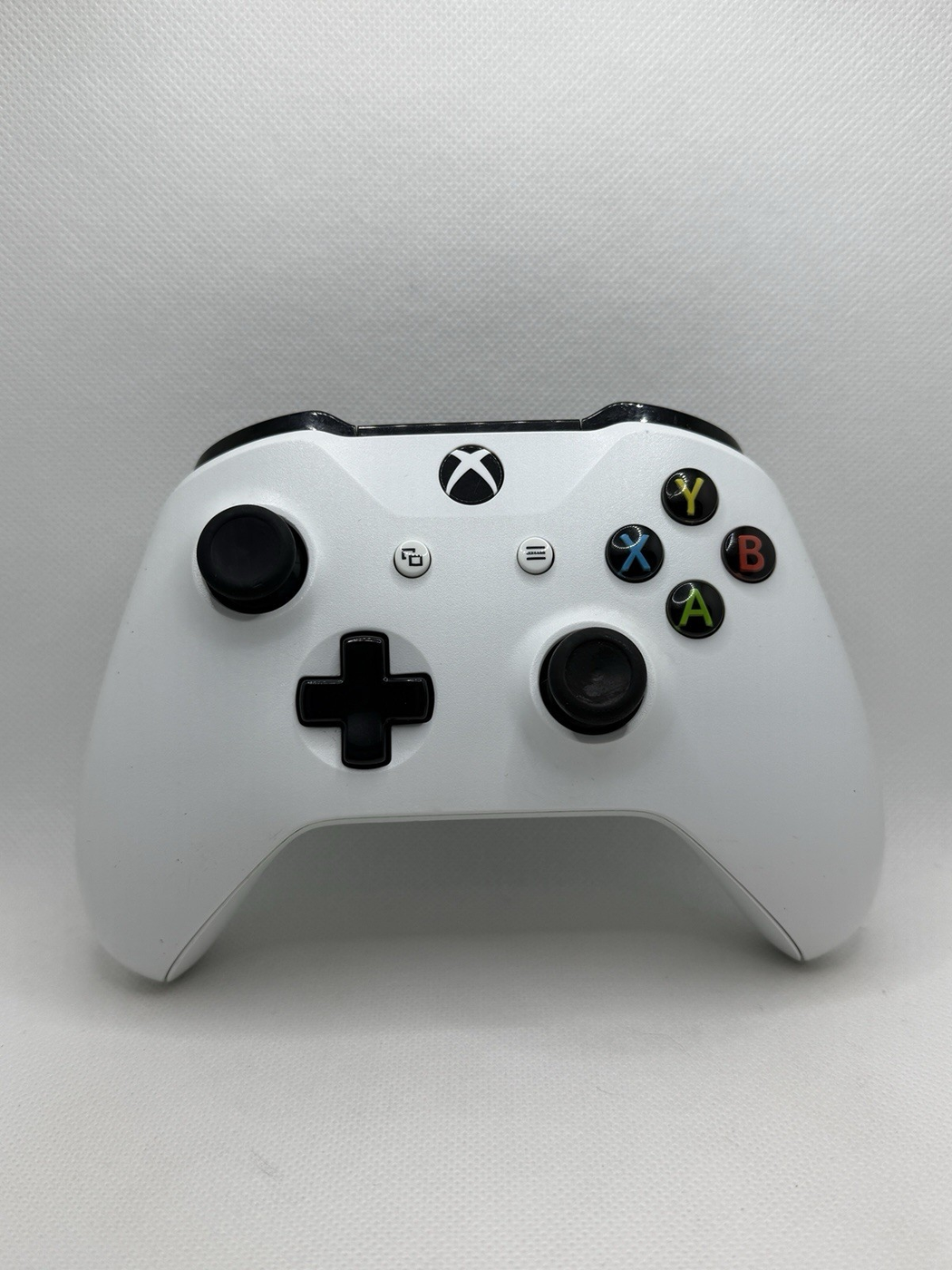 Used white Microsoft Xbox One wireless controller